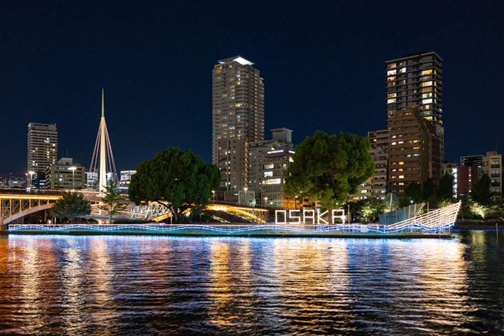 Winter night view of Osaka with illuminated city lights and seasonal ambience, showcasing the best night view spots in the city.